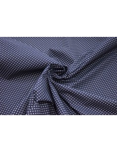 Pois bianco su sfondo blu di cotone