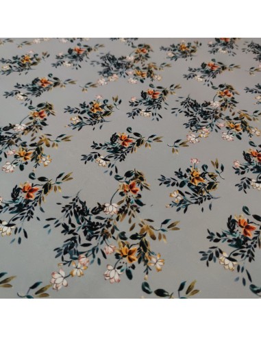 Microfriba floreale su sfondo grigio...